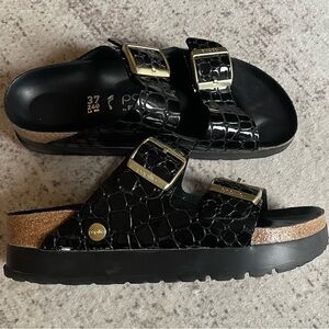 Papillio-Birkenstock’s Black gold Sandals